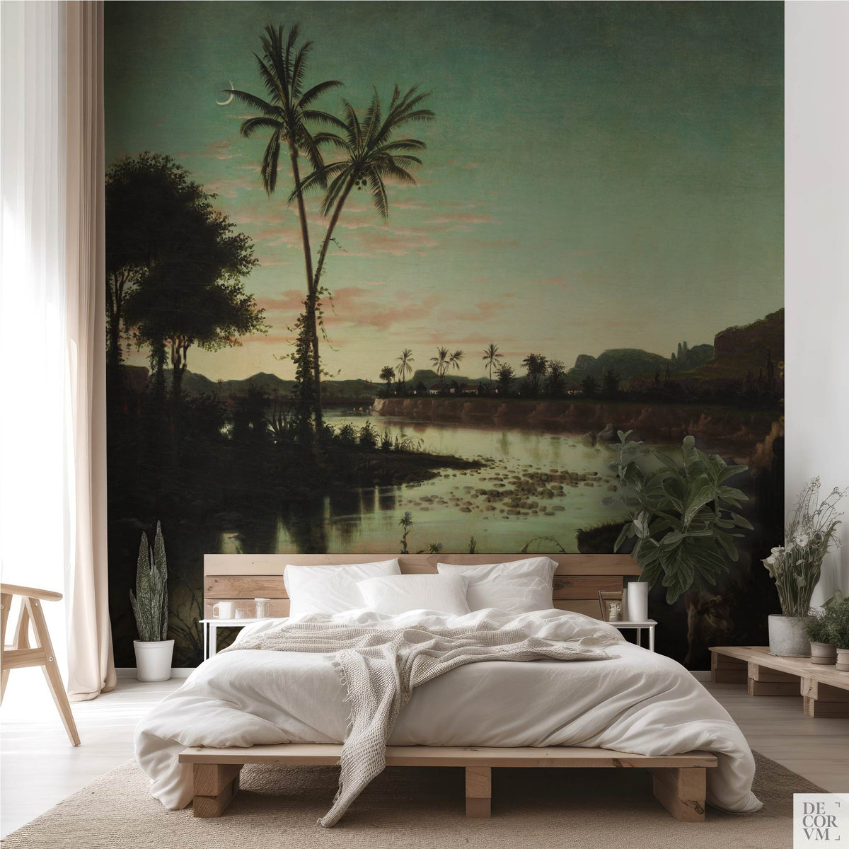 Minimalist bedroom interior showcasing the Tropical Twilight Palms Wallpaper Mural — Vintage Tropical Decor behind a low wooden bed frame, sheer curtains, and potted plants.