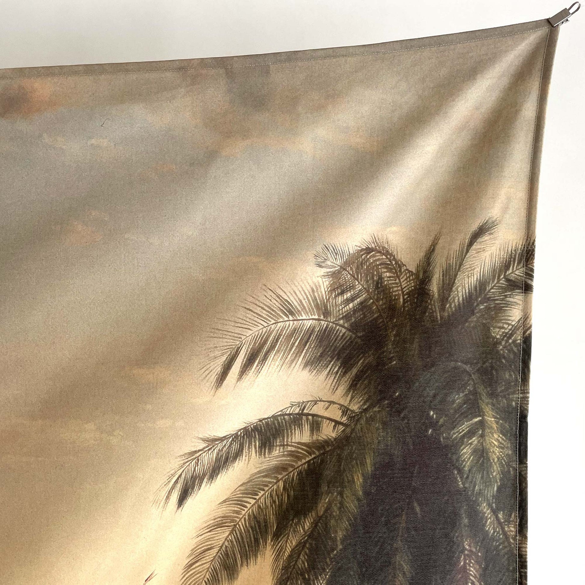 Top-right corner of the Frederic Church Cotopaxi wall tapestry showing palm fronds against the golden amber sky.