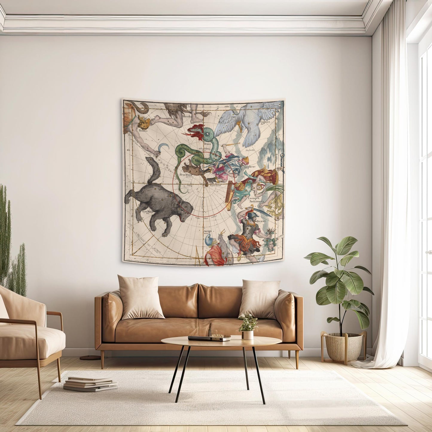 An elegant, sunlit living room featuring the Ursa Major celestial map tapestry mounted above a luxurious tan leather sofa, bringing a refined, scholarly touch to the warm and contemporary space.