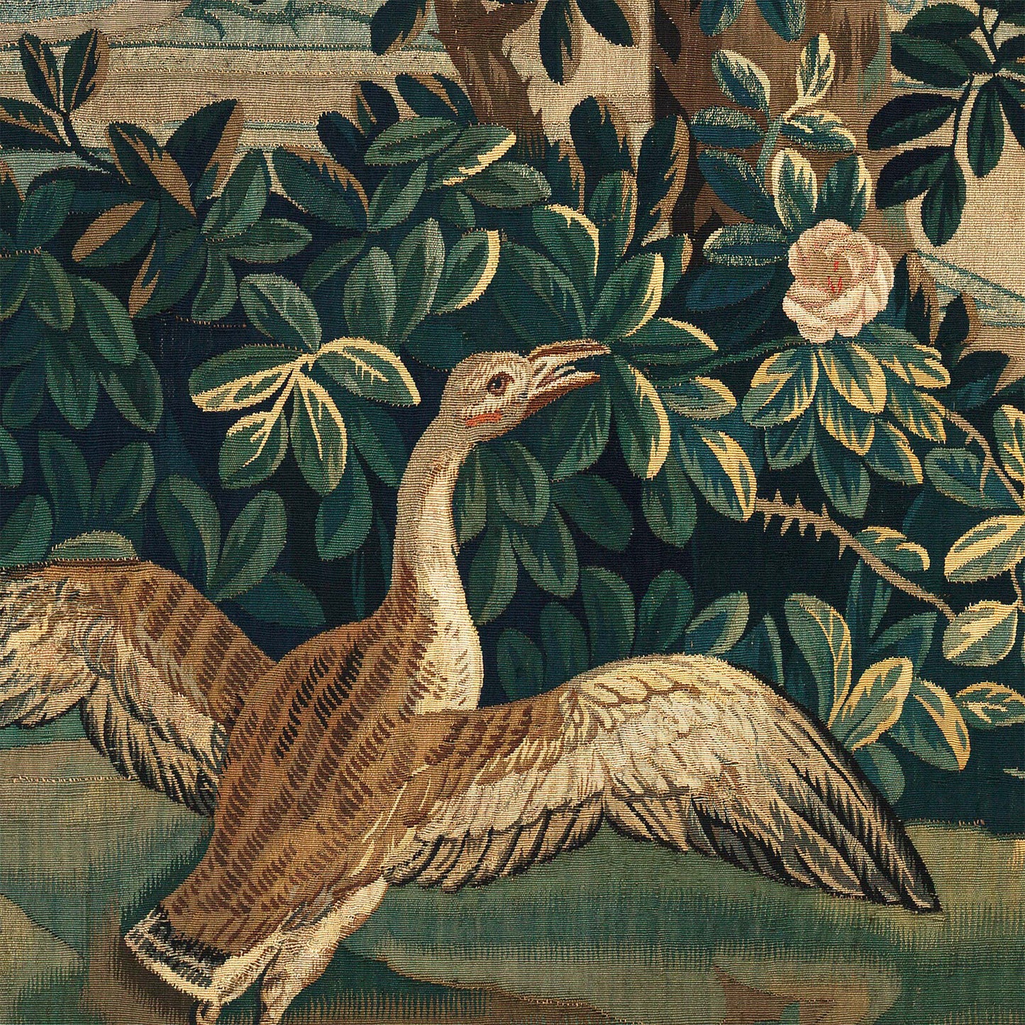 Brown bird with outstretched wings on a grassy lawn beside a pink rose — design detail from the 18th-century French verdure chateau garden.