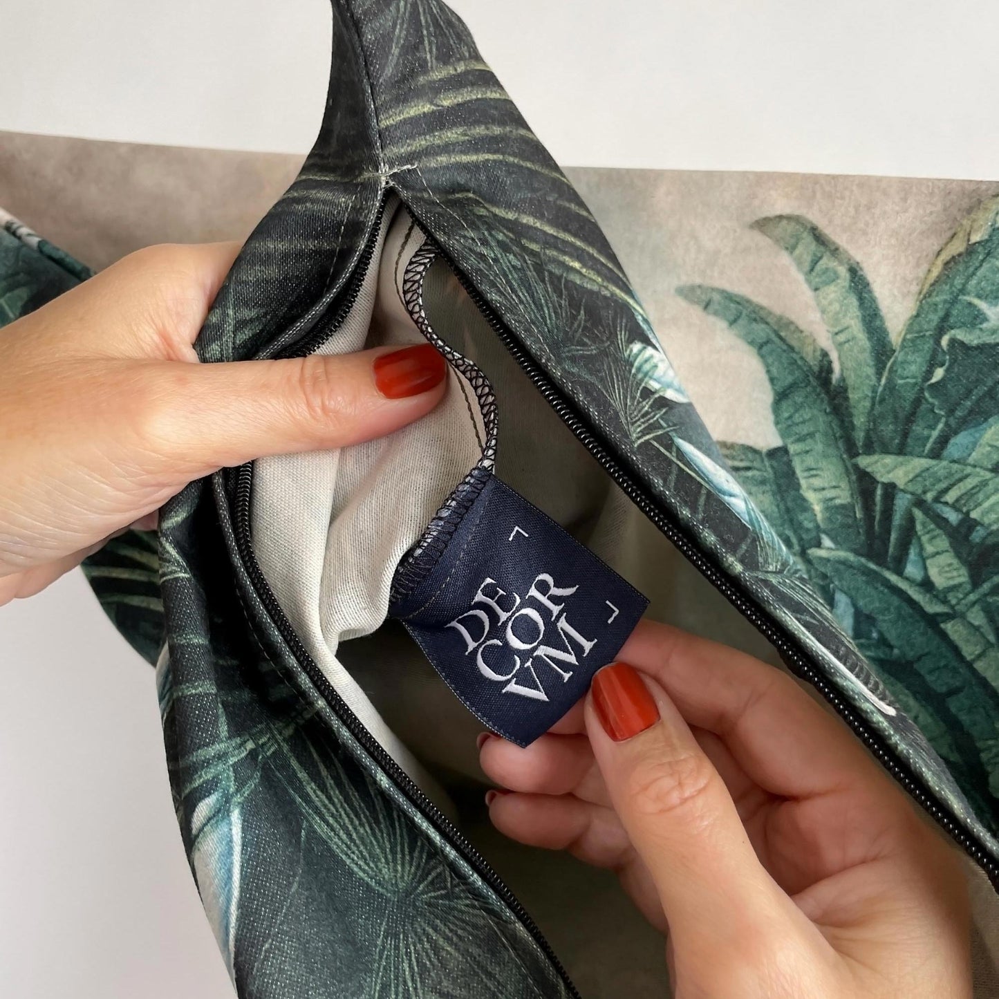 Inner lining and Decorvm woven brand tag inside the vintage tropical jungle pillow cover.