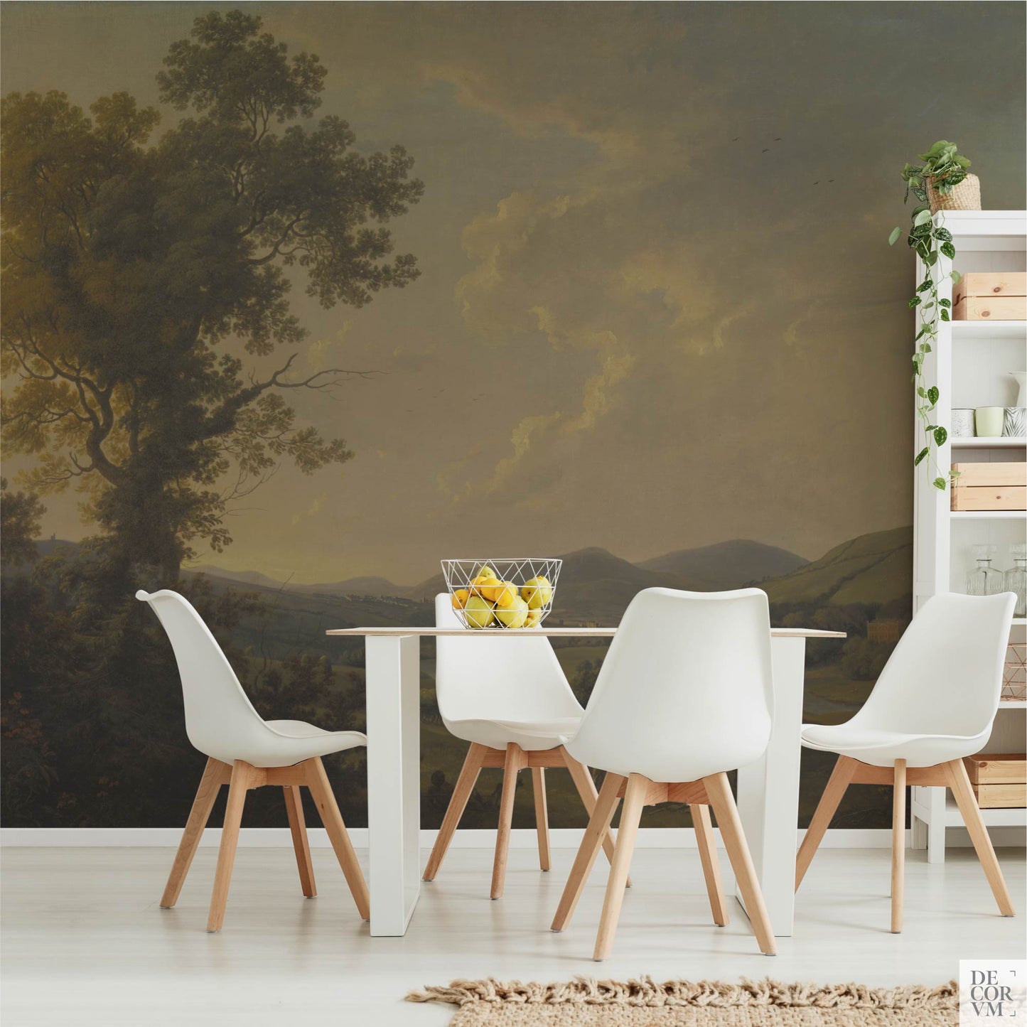 Modern dining space showcasing the 1780 William Ashford landscape mural as a scenic backdrop, paired with white modern chairs and fruit decor for a sophisticated farmhouse aesthetic.