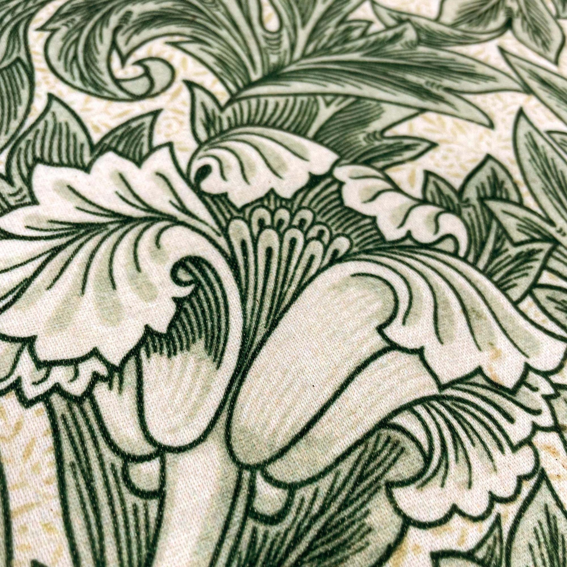 Macro of the sage cotton-polyester weave — design detail from William Morris's 1875 Tulip pattern.